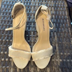 Sexy, round heel, open toe sandal.